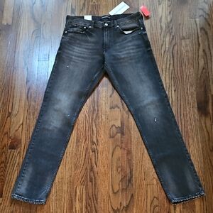 Calvin Klein Men's Faded Black, Purposely Distressed Slim Denim